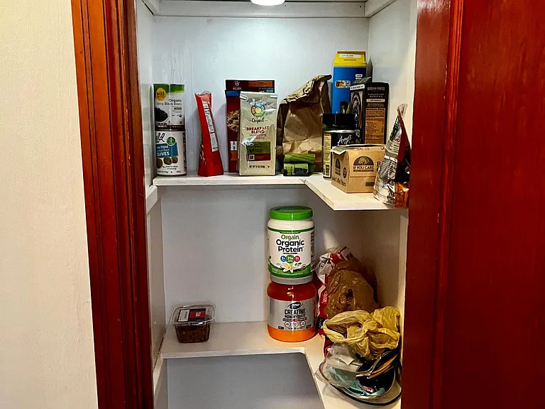 Small pantry for extra food storage.