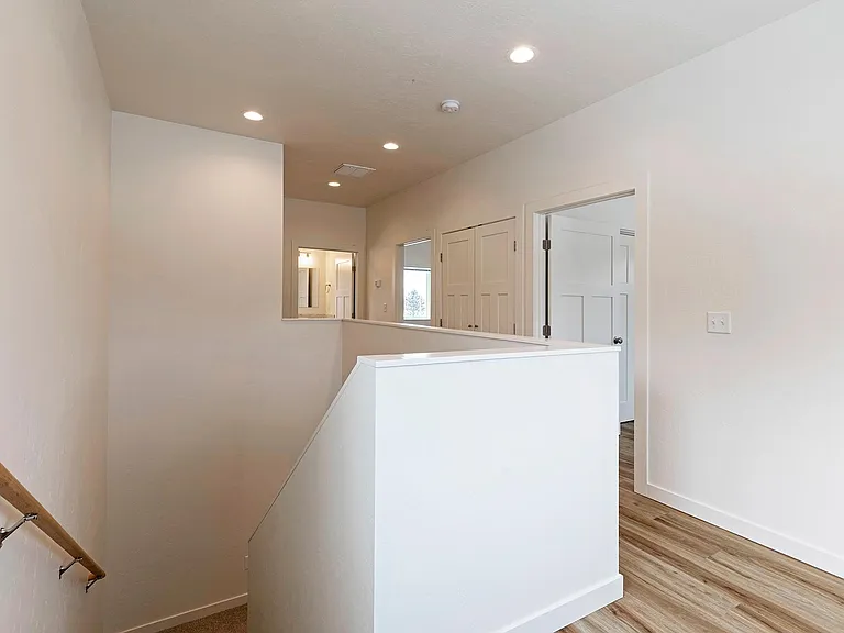 Upstairs landing/ bedrooms to the right, bath at end of hall