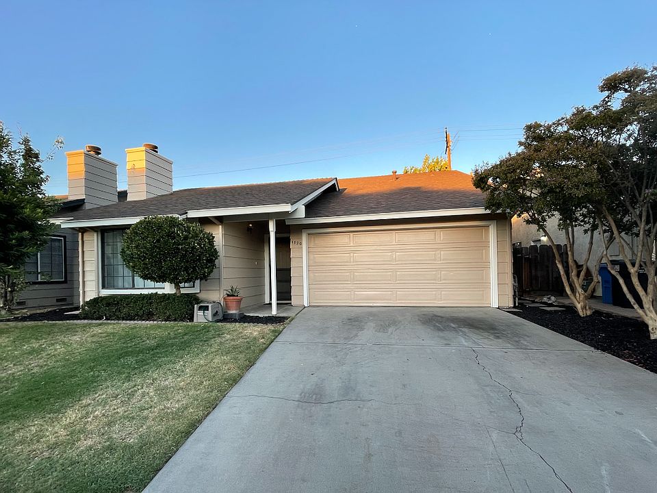 Front of home. Low maintenance yard. Spacious garage with garage door opener.