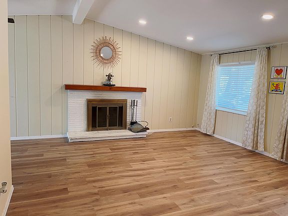 Larger living room with fire place