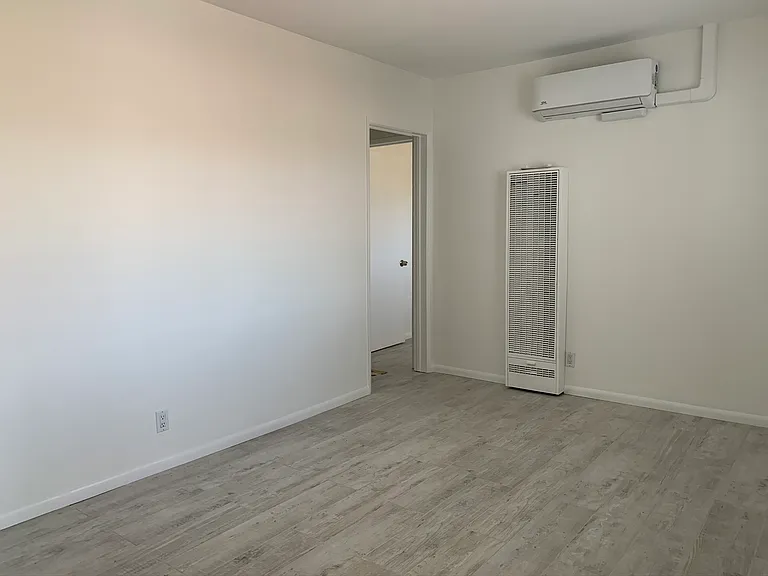 Mini split AC/heat unit with additional gas unit