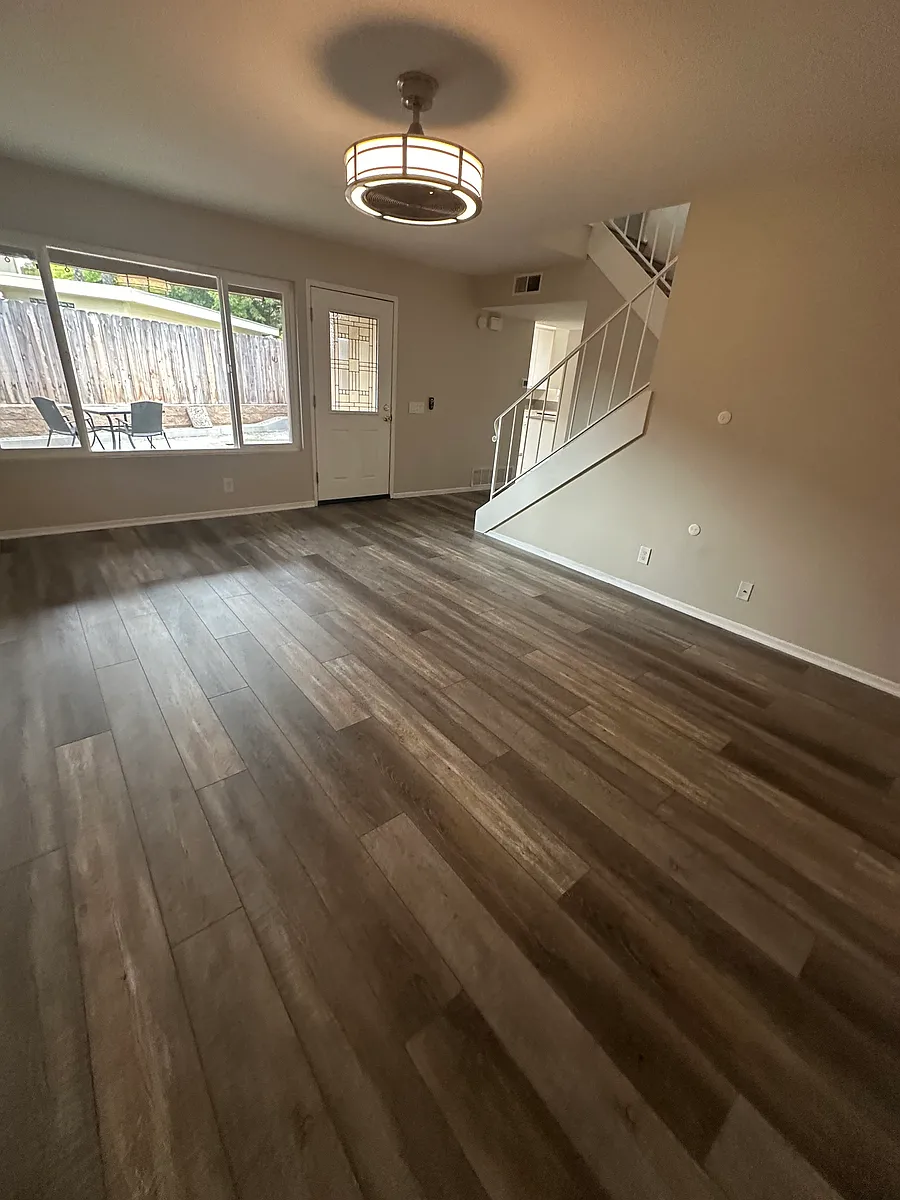 This rental features a welcoming living room with a large window for plenty of natural light, and offers total privacy with a lockable entry gate for added security. Perfect for anyone looking for a safe and comfortable home! - 13222 Saddle Ridge Rd