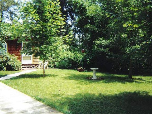 Behind house-private cottage/shed