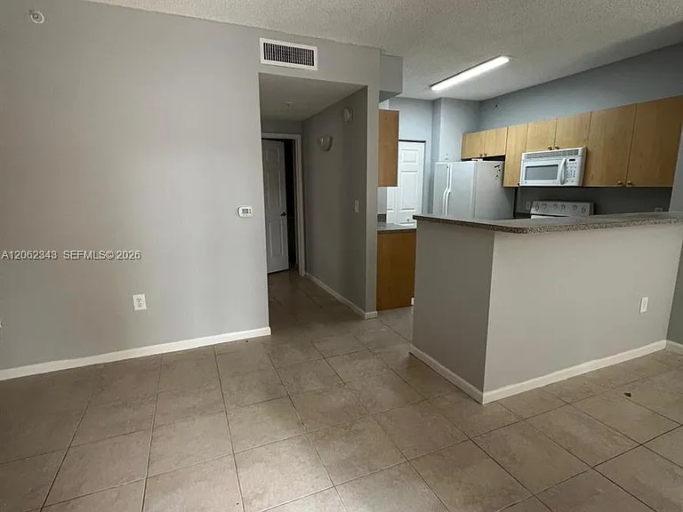 8020 N Nob Hill Rd #102 — Photo 2
