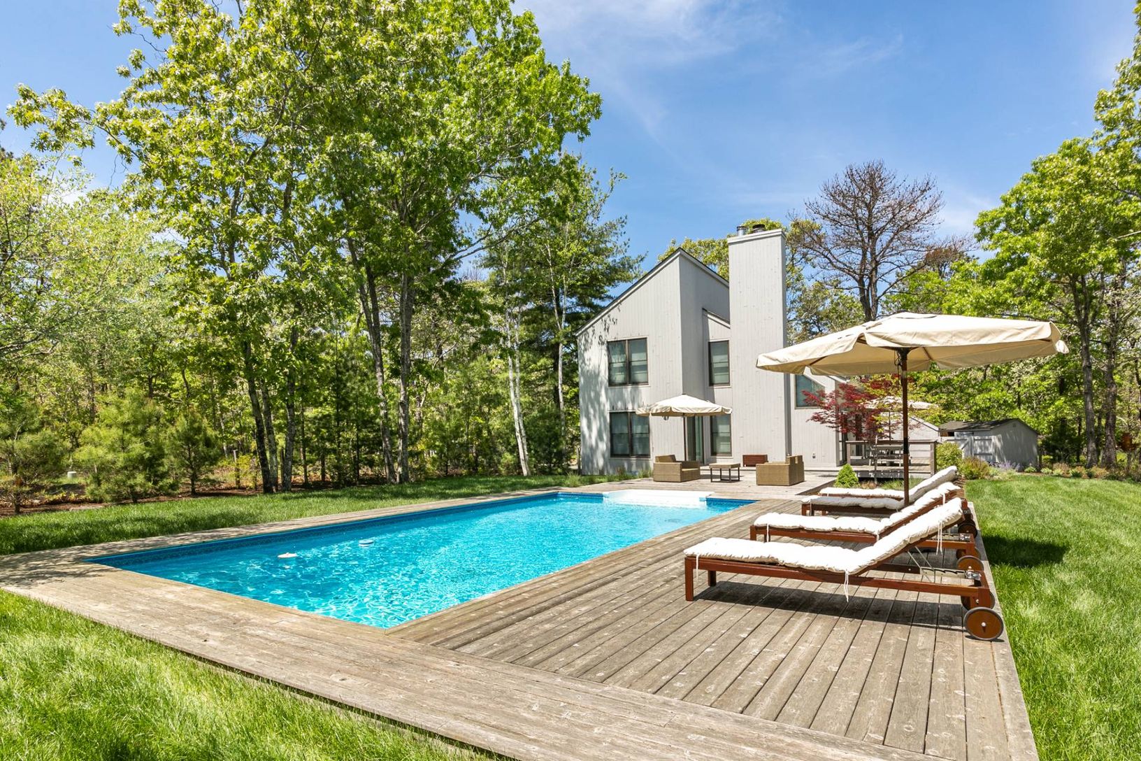 Rear View of Pool and Home