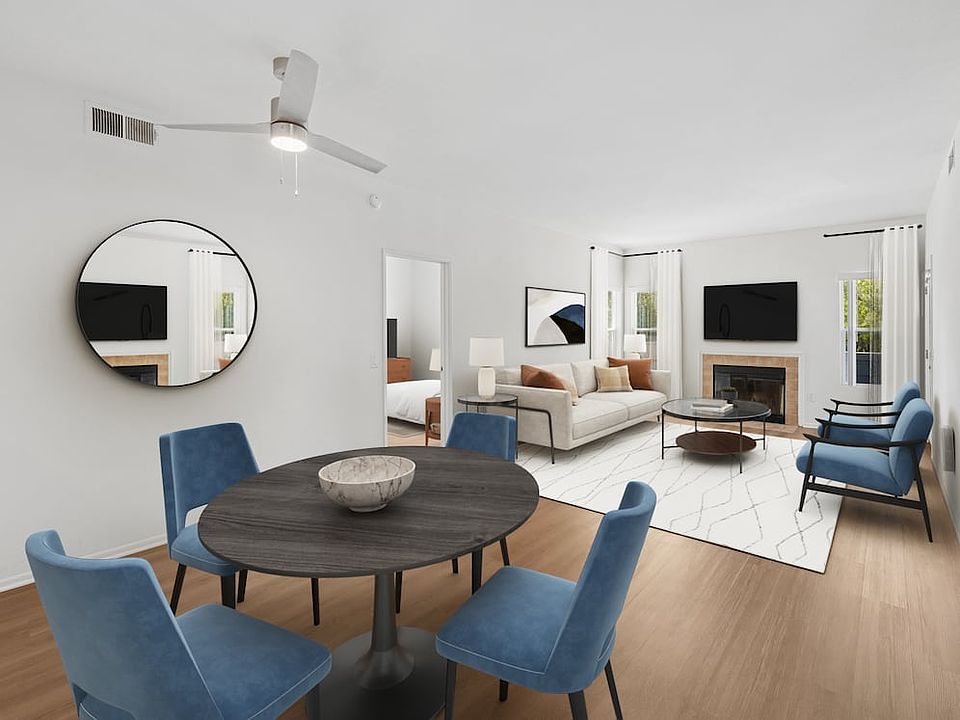 Renovated Package I dining and living room with hard surface flooring