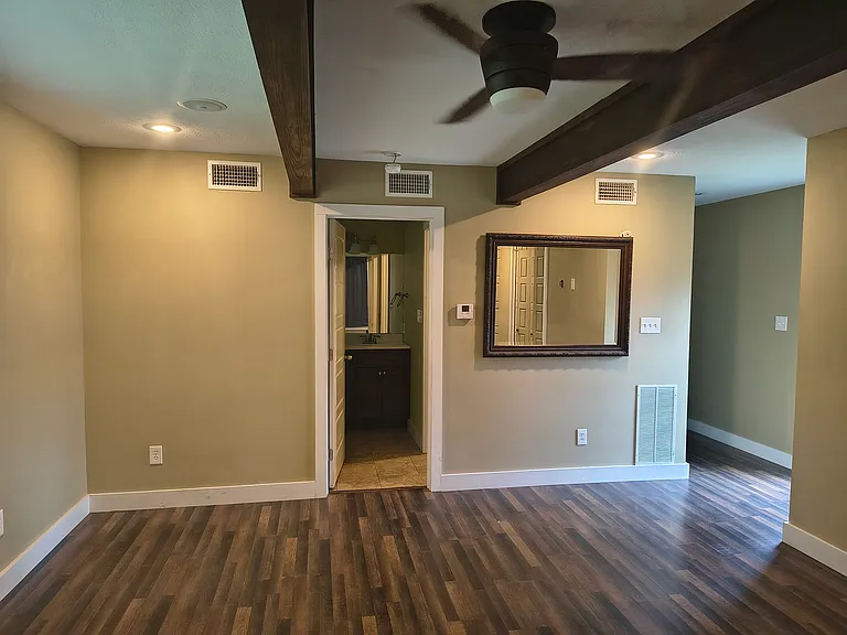 Master bedroom (15ft x 14ft) with two walk-in closets (7.5ft x 5.5ft and 7.5ft x 3.5ft)