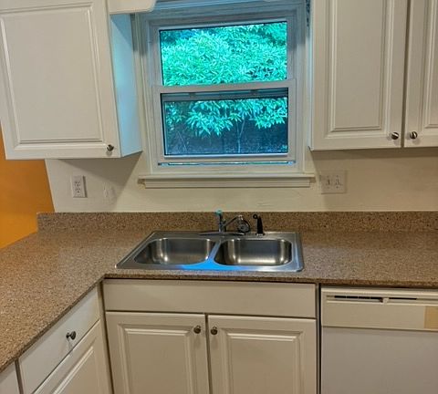 Kitchen sink looking into back