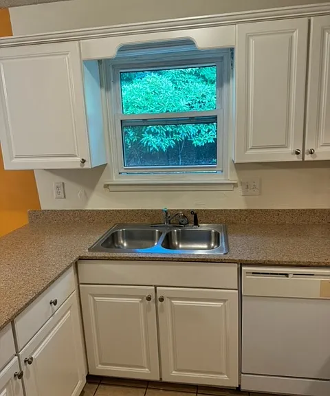 Kitchen sink looking into back