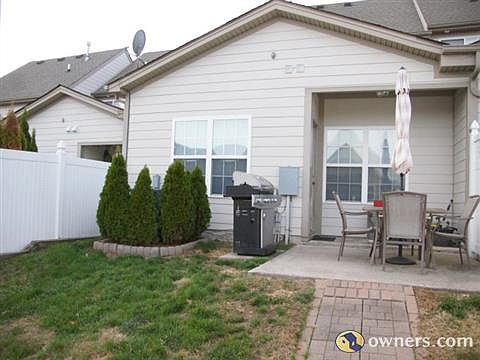 Back porch/yard with 6 foot privacy fence