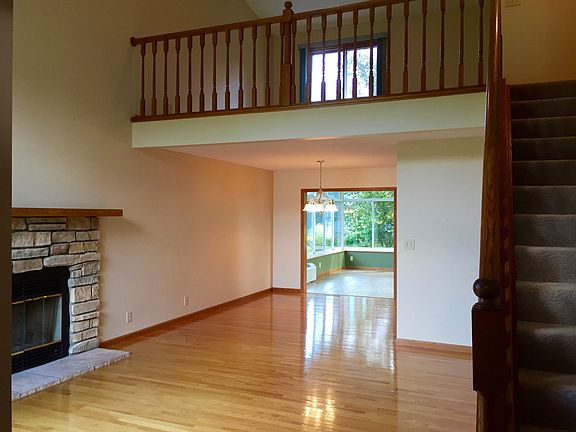 Entrance-Showing Living Room, Dining Room, Sunroom, and Loft