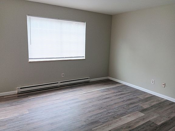 Living Room w/ Baseboard Heater