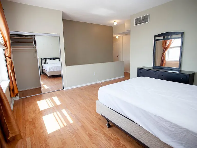 Bedroom + closet + stairwell