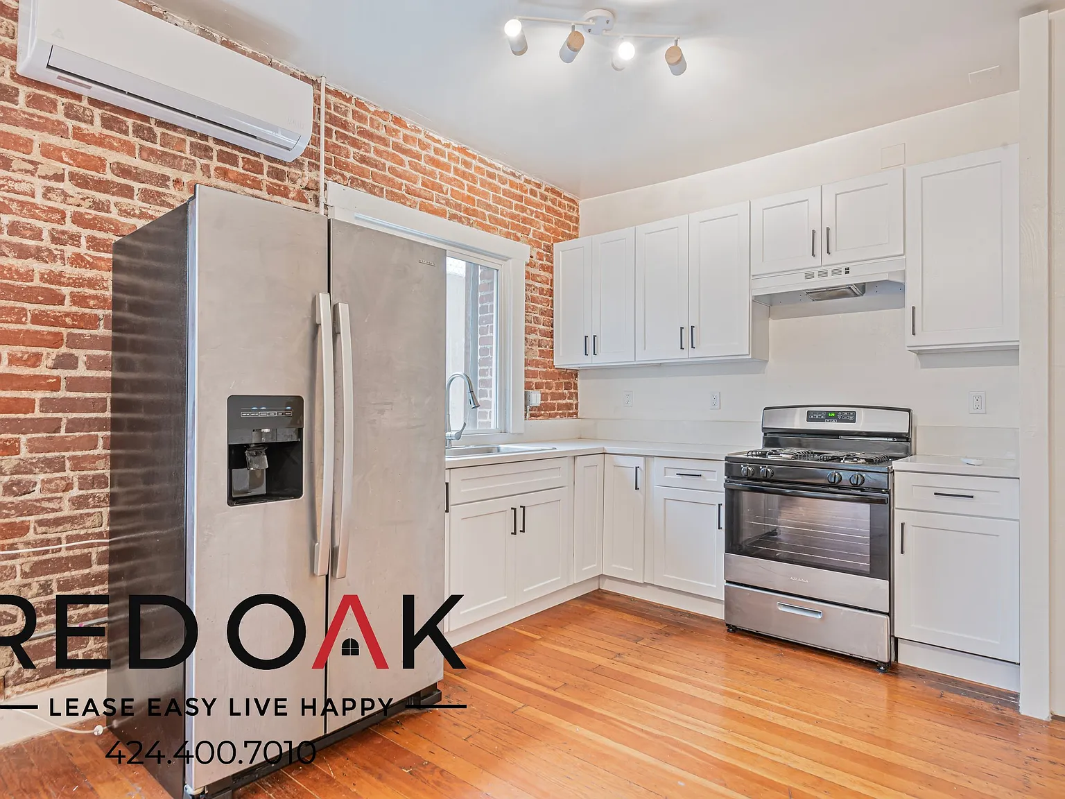 Welcoming 1-Bed with Exposed Brick and Stainless Steel Appliances ~ In Historic South-Central! — Photo 2