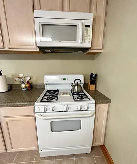 Propane cooking, new microwave. All untensils, cookware and linens