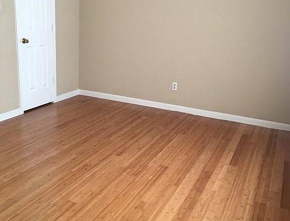 Master suite is large with en-suite master bath that offers new marble flooring, a jetted tub, new quartz counters, and a separate shower *2nd living w-built-ins! Beautiful crown molding