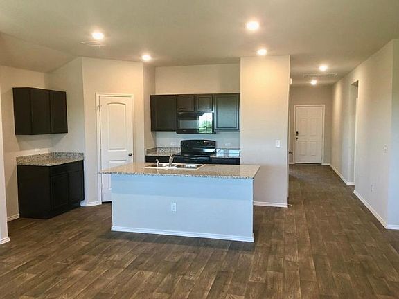 Open layout kitchen with large pantry (refrigerator now installed)