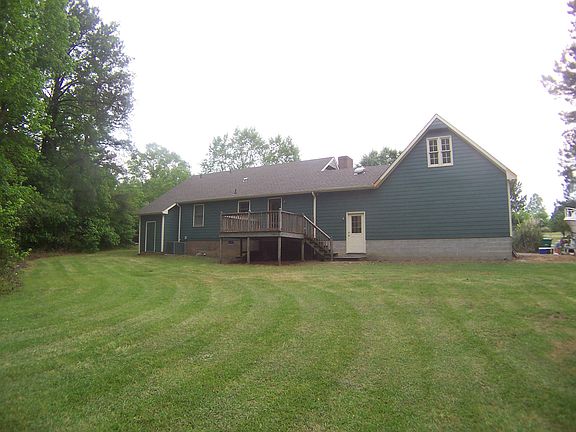 Exterior Back- Wow over 1.6 acres of land