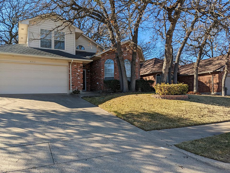 Two car garage. Yard maintained by professional landscape service so you don't have to! Large mature trees provide lots of shade for those hot days.