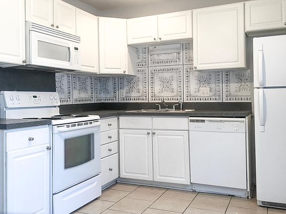 Eat-in-Kitchen comes complete with full size appliances, pantry, and space for a table and chairs