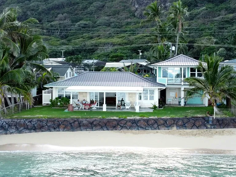 We live in the main house. The rental is the second story portion with a separate entrance.