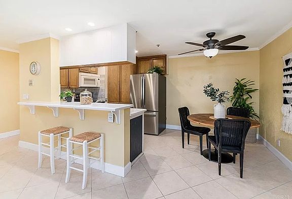 Another view of the kitchen and dining area. All stainless appliances are almost new and in great shape.