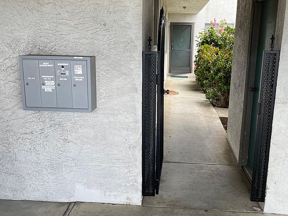 Mailbox on the left laundry room on the right garden area and stairway to the second story