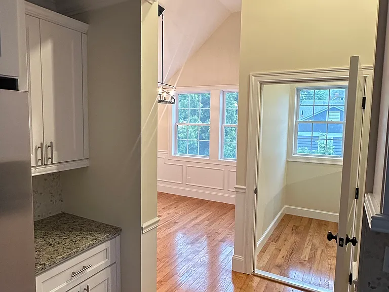 Flex dining/office space off of back corner of kitchen. Entry door.