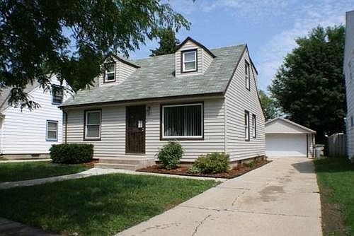 House with Driveway Entrance