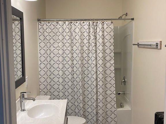 Bathroom with full tub