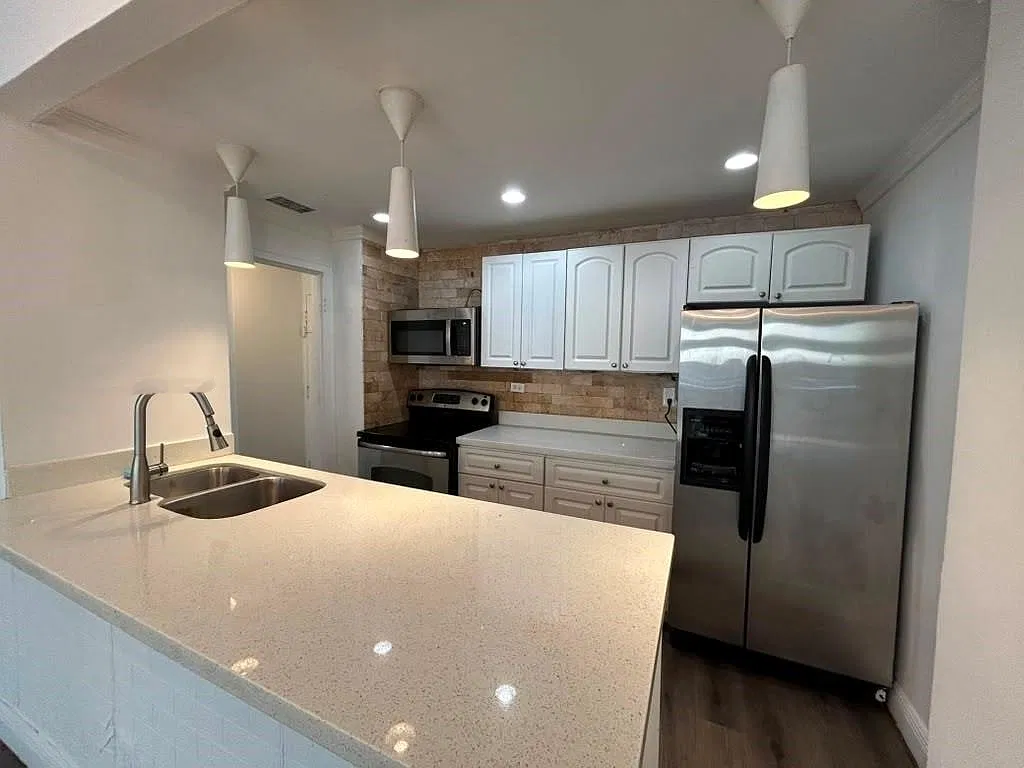 7545 E Treasure Dr — Photo 1