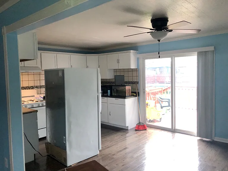 Kitchen & Dining Area
Back Porch Sliding Door