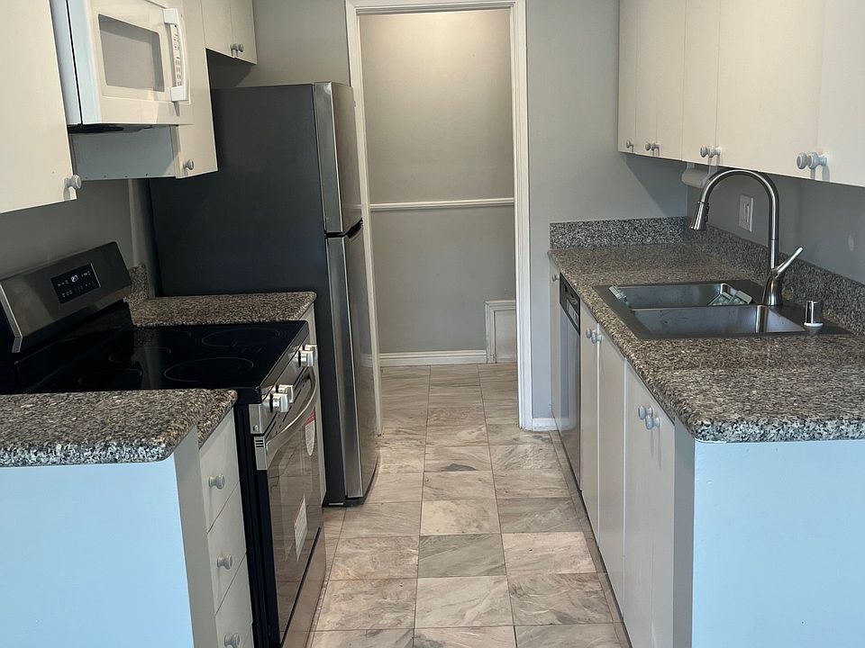 Kitchen looking towards front entry way