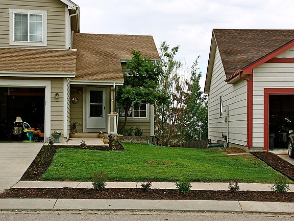 Front of house and yard during summer