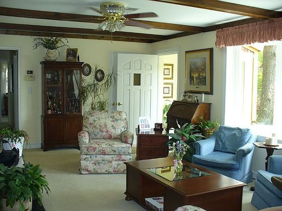 Livingroom Has Beautiful Bay Window, Ceiling Fan, Wood Burning Fireplace Inser