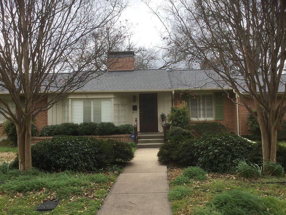 Front with landscaping. 