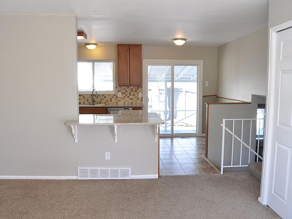 Open Layout from Living Room to Kitchen. Great Indoor/Outdoor Living