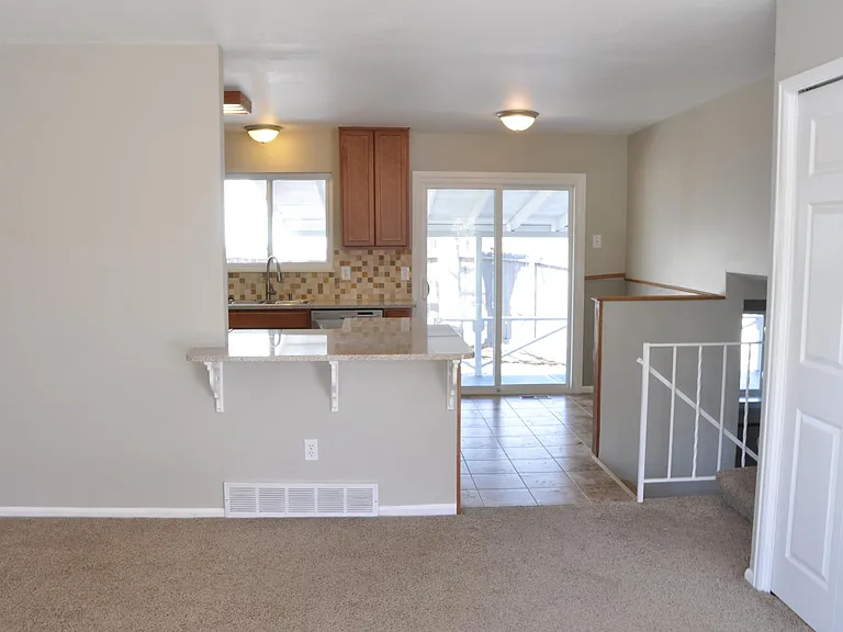 Open Layout from Living Room to Kitchen. Great Indoor/Outdoor Living