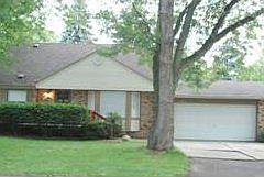 Front with porch + 2 car garage