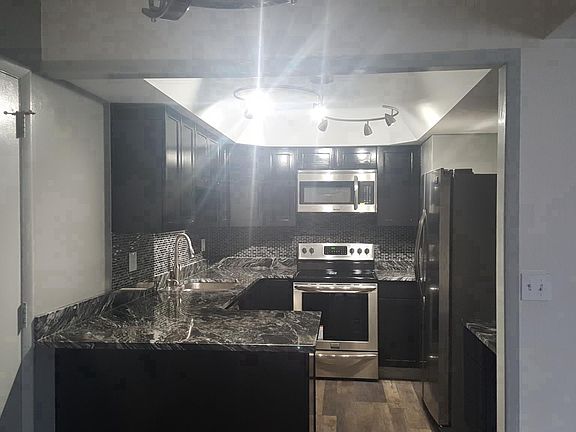 Kitchen with all new appliances and granite counter tops