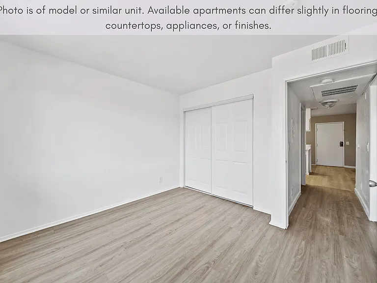 Comfortable bedroom complete with updated finishes and ample storage.