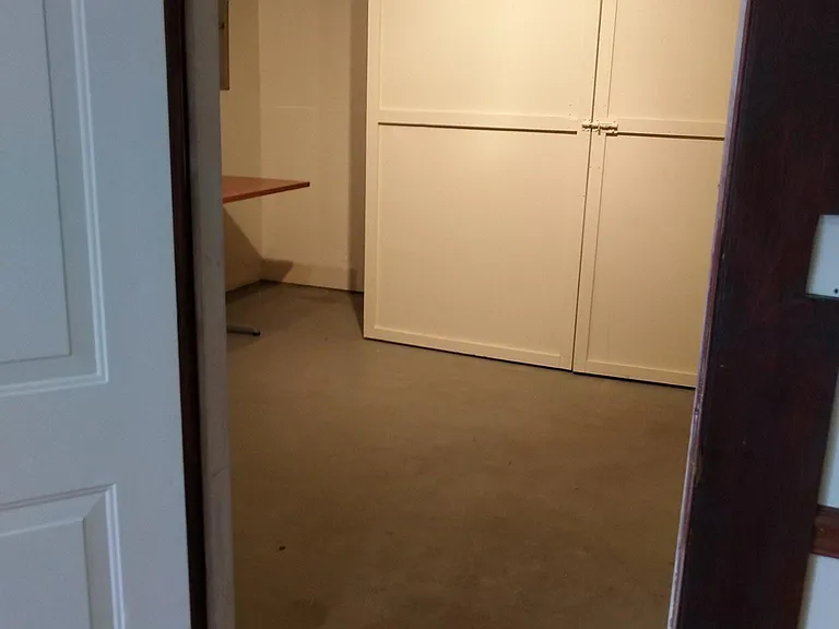 Large 12' x 12' storage room with built in shelves!