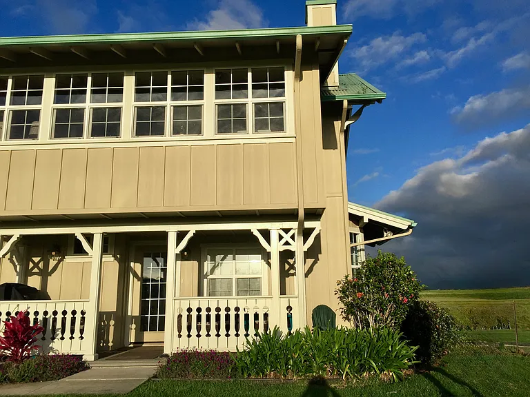 Lower exterior lanai with Weber grill & upper enclosed lanai that has 180 degree views of Mauna Kea, Mauna Loa and Hualailai volcanos.