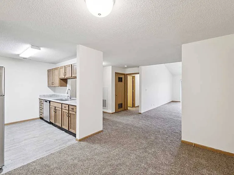 Our open-concept layouts make entertaining effortless, blending kitchen and living spaces for a warm, inviting atmosphere.