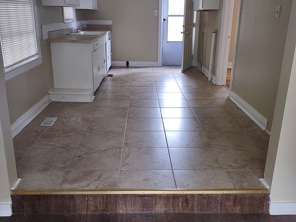 View from foyer into kitchen with eat-in area