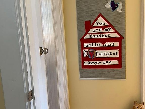 Small office door to the left in vestibule