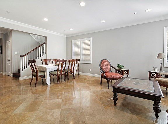 Upon entering home, you will be greeted with a bright and open combination Dining and Living room area.