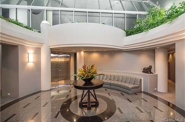 Enter through the double doors in to the rotunda.