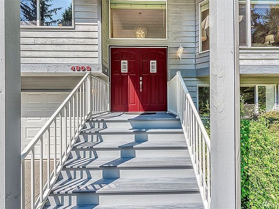 Covered Front Porch Made With Trex-Deck Material. Updated Exterior Paint.