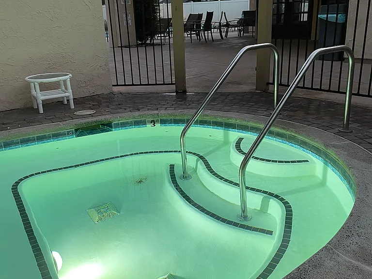 Private jacuzzi in gated pool area